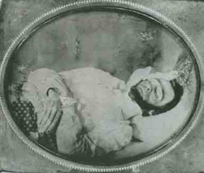 Figure 1 - Posed false image of Abraham Lincoln on his deathbed.  In the public domain.