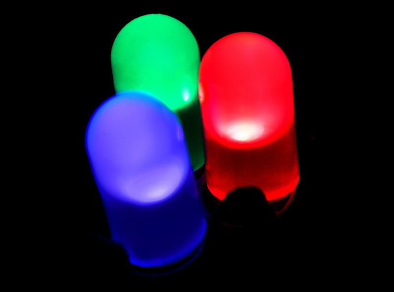 Figure 2 - Large size red, green, and blure LEDs the fundamental components of an LED display.   From the Wikicommons by PiccoloNamek  and in the public domain under creative common license.