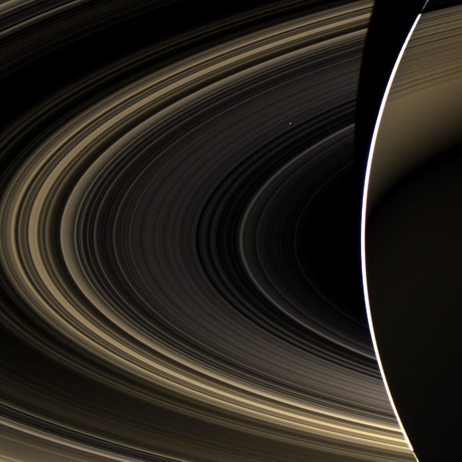 Figure 1 - Venus glimmering brightly through the rings of Saturn taken by the Cassini-Huygens satellite on November 10, 2012 from NASA and in the public domain.